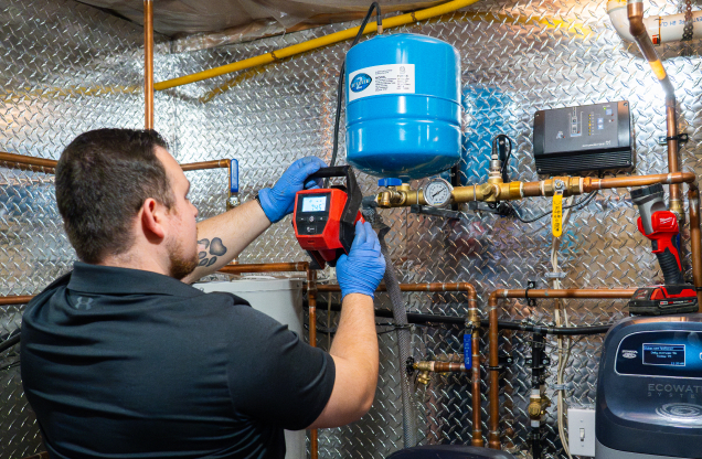 Nelson Water's well inspector assessing well system in ottawa property